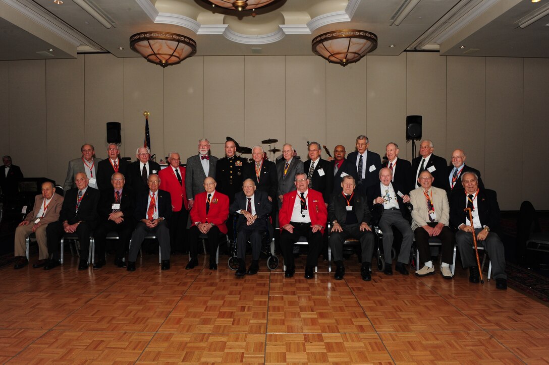 Assistant Commandant of the Marine corps Gen Joseph F. Dunford stands Iwo Jima veterans at the Iwo Jima 67th Anniversary Reunion in Arlington, Va on Feb 18, 2012.(Official Marine Photo by Cpl Scott R Picklesimer/Released)